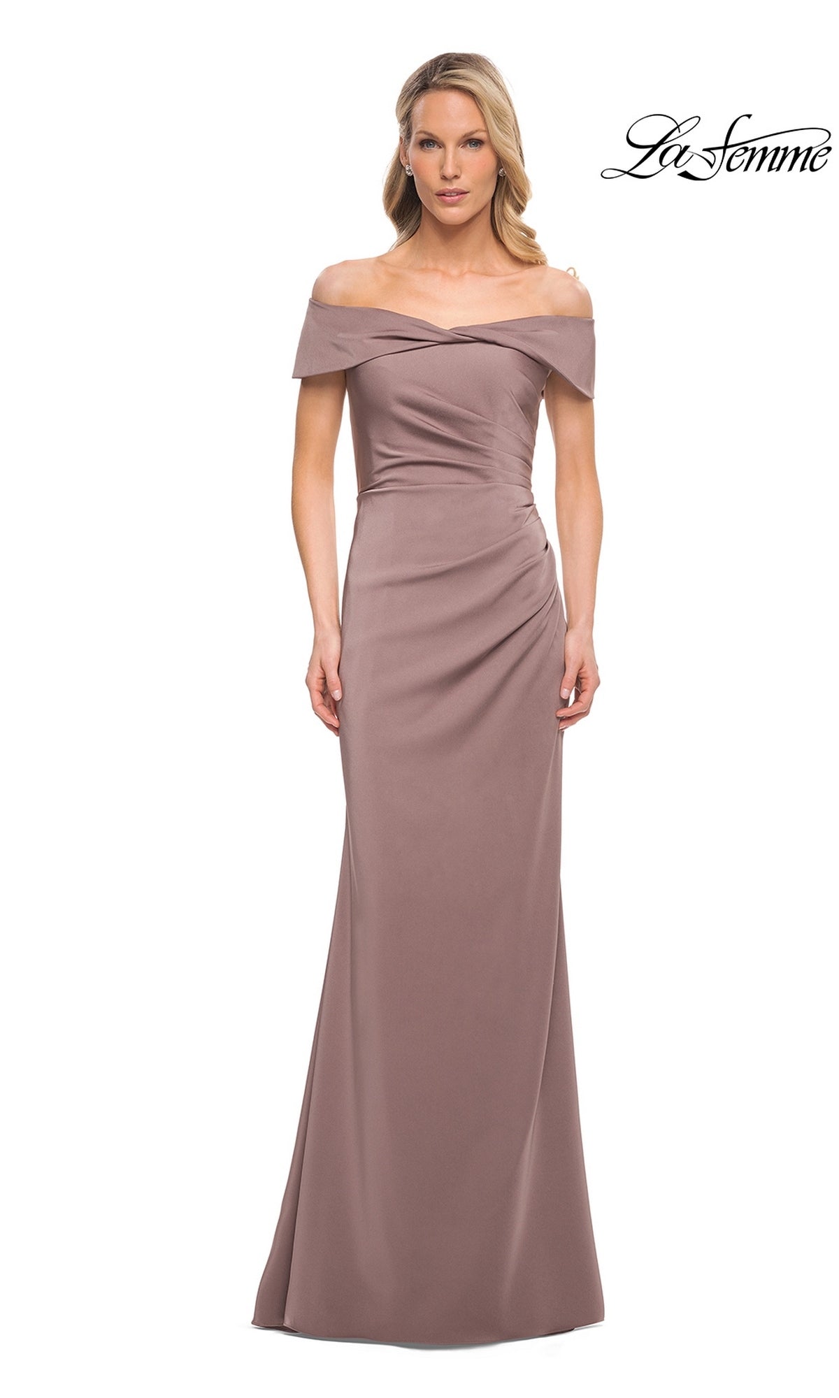 A woman wears a Long Formal Dress: La Femme 30397, a floor-length, off-the-shoulder cocoa satin gown with a gathered waist and an elegant portrait collar.